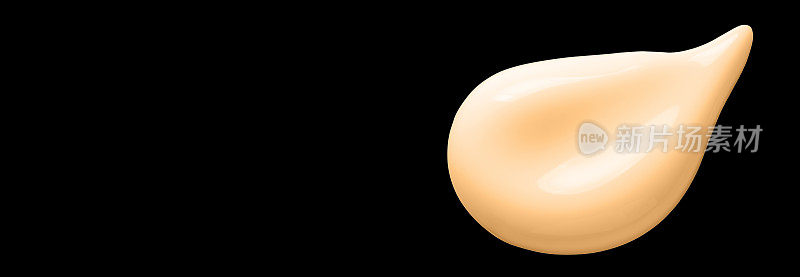 A sample of brown foundation or sunscreen. Isolated on a black background. Copy space.